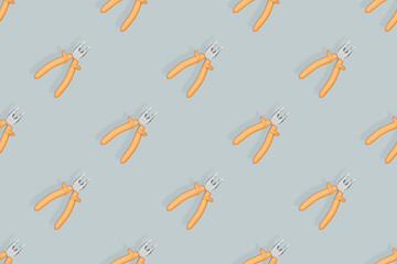 Pliers seamless pattern. Metal pliers with rubber grips.