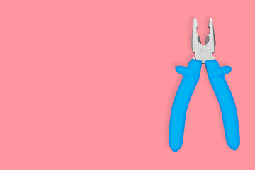 Metal pliers with rubber grips Background on the theme of tools, repair or maintenance of equipment.
