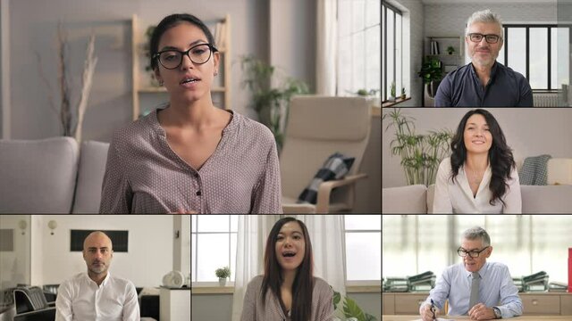 Group Of Multi-ethnic Diverse Business People Talking And Looking To The Camera Partecipate At A Conference Video Call With Female Leader,coach Mentor Speaking During Video Chat Online Training Screen