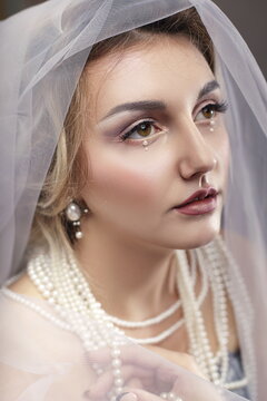Young lady in veil