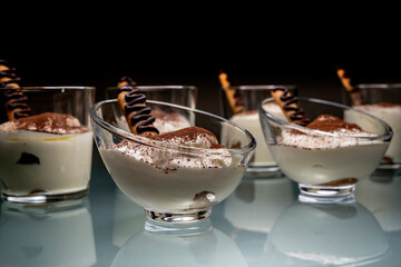 Tiramisu  is a coffee flavoured Italian dessert. It is made of ladyfingers dipped in coffee, layered with a whipped mixture of eggs, sugar and mascarpone 