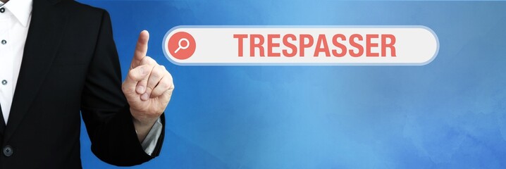 Trespasser. Lawyer (man) points with his finger to an internet browser. Text is in the search box....