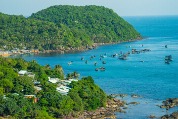 Aerial view of traditional fishermen boats lined in An Thoi harbor of Duong Dong town in the popular Phu Quoc island, Vietnam, Asia.