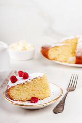 Semolina cake on a white plate. Slice of homemade sweet semolina cake