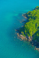 Fototapeta na wymiar Aerial view of sea waves and fantastic rocky coast at Hon Thom island in Phu Quoc island, Kien Giang, Vietnam