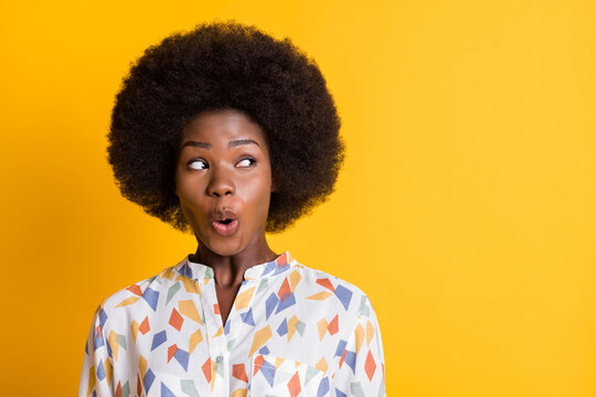 Portrait of shocked person look empty space open mouth cant believe isolated on bright yellow color background