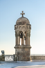Fototapeta na wymiar Bell tower of emple of Expiatori del Sagrat Cor on top of Mont Tibidabo in Barcelona Spain