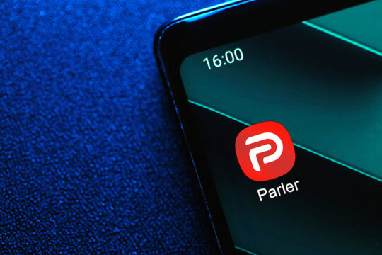 Close up Parler application icon on the Android phone screen. Parler is a social media banned from Google Play and App Store. PENANG, MALAYSIA - 14 JAN 2021.