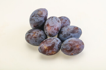 Purple sweet ripe plum heap