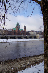 Winter wonderland landscape scenery at River Isar in dowtown Munich, great for walks in outdoor...