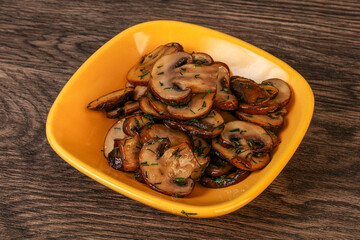 Roasted champignon with herbs and spices
