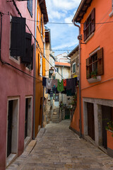 Fototapeta na wymiar Street scene in old mediterranean town of Rovinj, Croatia.