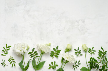 Naklejka na ściany i meble Floral background of eustoma on a concrete background