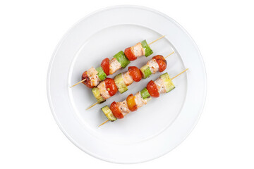 Salmon kebab with zucchini and a beautiful red tomato.