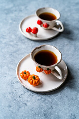 Handmade Ceramic Coffee or Tea Cups with Pumpkin and Mushroom Pattern Figure Design Handcrafted. Handicraft.