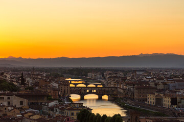 Fototapeta na wymiar Skyline view at Florence in sunset with Arno river