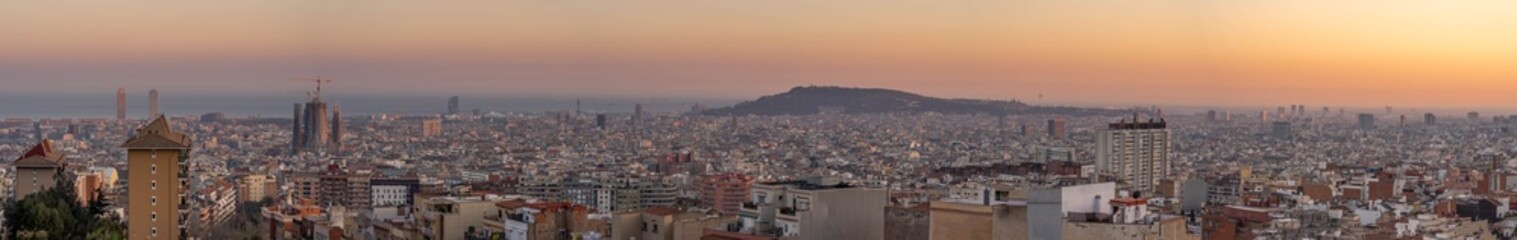 Fototapeta na wymiar Super wide Panoramic view of Barcenola city skyline in winter sunset hour in Spain
