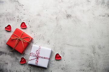 Valentine's Day, Gift box with a ribbon and candles.