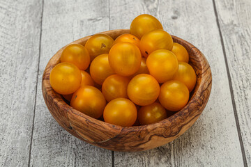 Fresh yellow cherry tomato heap