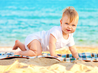 Happy baby kid is enjoying summer vacation