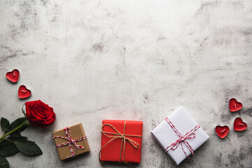 Valentine's Day, Gift box with a ribbon, candles and rose.