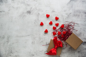 Valentine's Day, Gift box of kraft paper with a red heart candy - 405450736