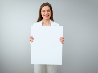 Smiling buisness woman shoving empty white banner.