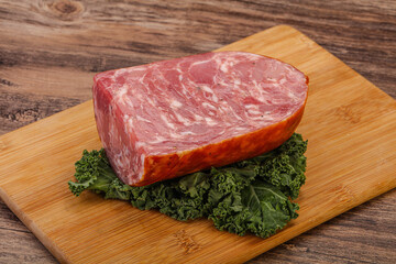 Beef ham piece over board