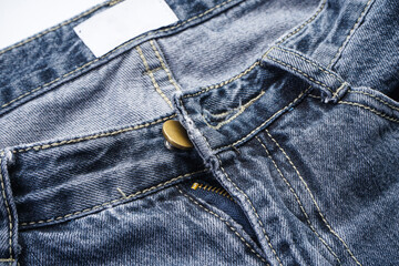 Jeans background, denim with seam of fashion design, space for text.
