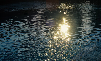 surface of blue swimming pool with sun reflection background. - 405456799
