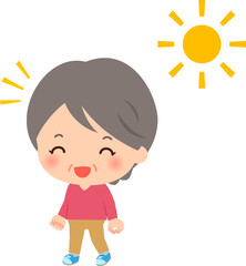 散歩するシニア女性と太陽