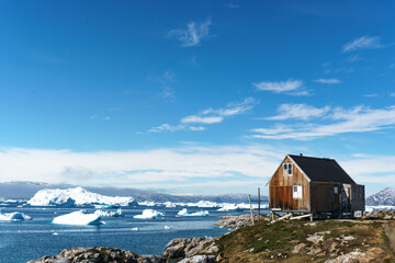 Hut in Tiniteqilaq. © Michal Czub