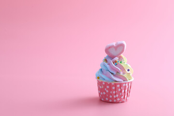 colorful cupcake isolated in pink background
