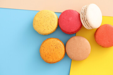 Colorful macarons isolated in pastel background