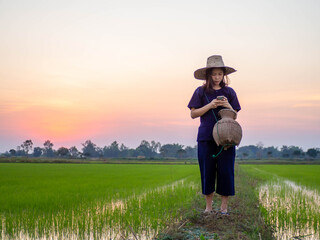 Young farmer wearing traditional Thai costumer