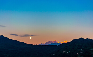 Full moon and Mt. Kanchenjunga