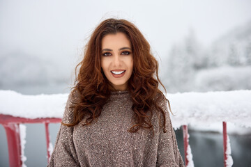 Attractive young woman in wintertime outdoor