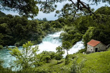 Large waterfall in forest 