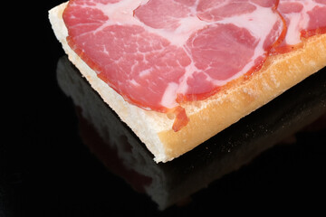 Sandwich with raw smoked pork meat