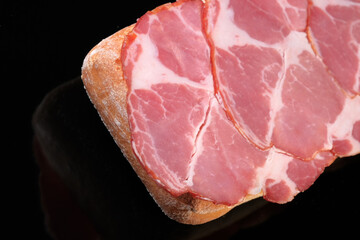 Sandwich with raw smoked pork meat