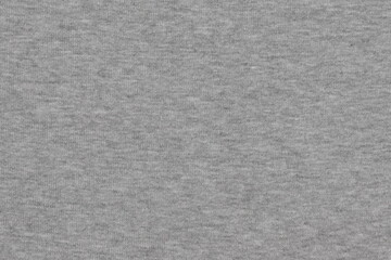 Fototapeta na wymiar Texture of gray fabric for clothing.