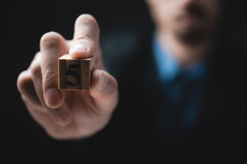 number text on business hand, concept of number in businessman