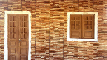 Texture front old wood brown house door and window