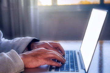 person typing on laptop