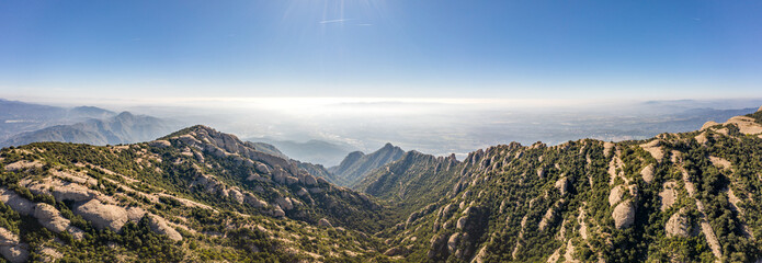 Panoramic aerial drone shot view of Montserrat mountain rage in morning near Barcelona