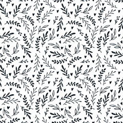 Seamless pattern with twigs and hearts.
