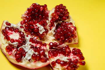 pomegranate on a yellow background