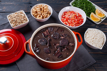 Typical Brazilian dish called Feijoada. Made with black beans, pork and sausage