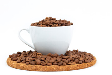 A cup of coffee beans isolated on a white background.
