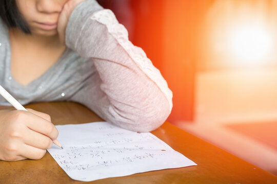 Attention deficit hyperactivity disorder (ADHD) and Learning disability (LD) in children and teens concept. Asian students practice math subject for test. Education student studying.